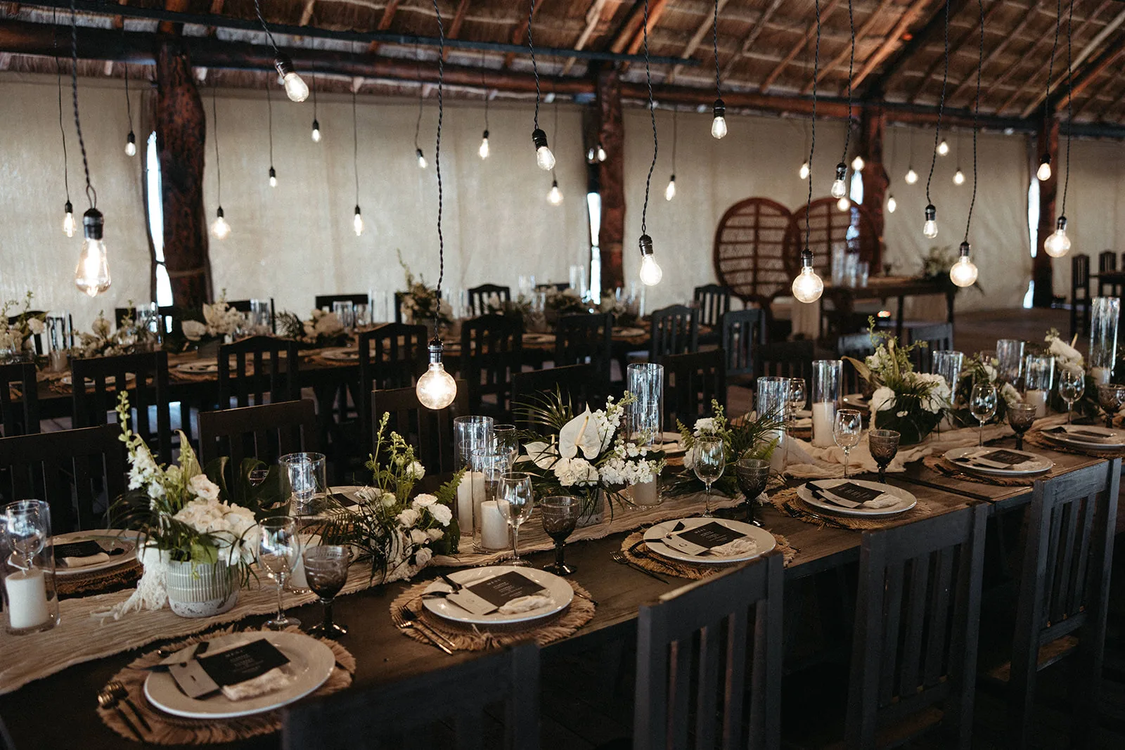 Candlelit boho reception under a palapa — Blue Venado